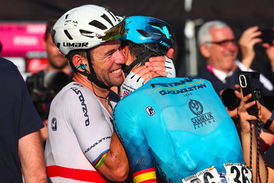 Mark Cavendish embraces teammate after the final stage of the 2023 Giro d'Italia