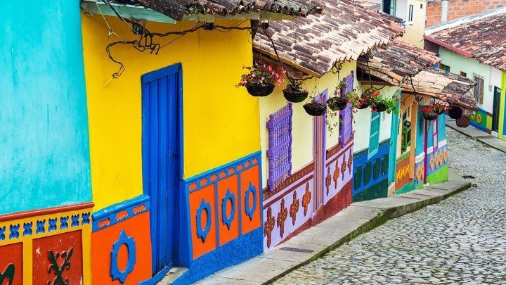 Colorful Colombian houses along cobbled street