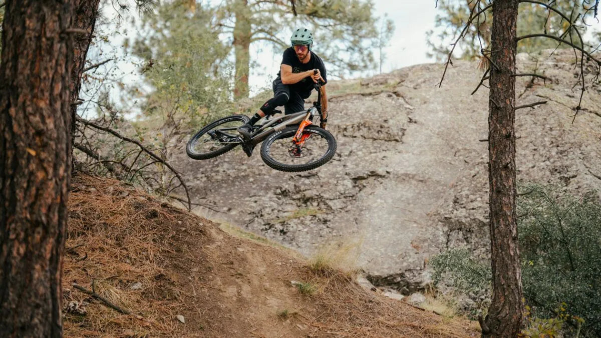 Loam Wolf reviewer wearing Etna helmet while riding